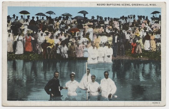 Also at the ICP, 'Take Me to the Water,' featuring historic images of American river baptisms. The postcard above shows a baptizing scene from the 1920s in Greenville, Miss.